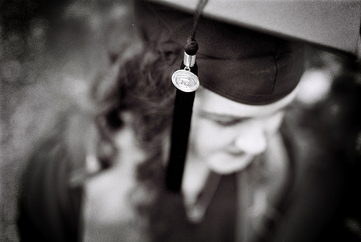 Kennesaw State University graduation cap and tassel on black and white film during a KSU senior portrait photography session by Kennesaw senior photographer Amber Watson.