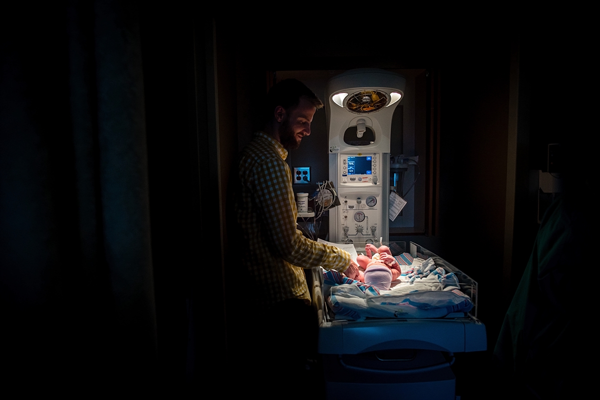 Newborn in warmer bassinet during an Atlanta birth photography session at Kennestone Labor and Delivery in Metro Atlanta