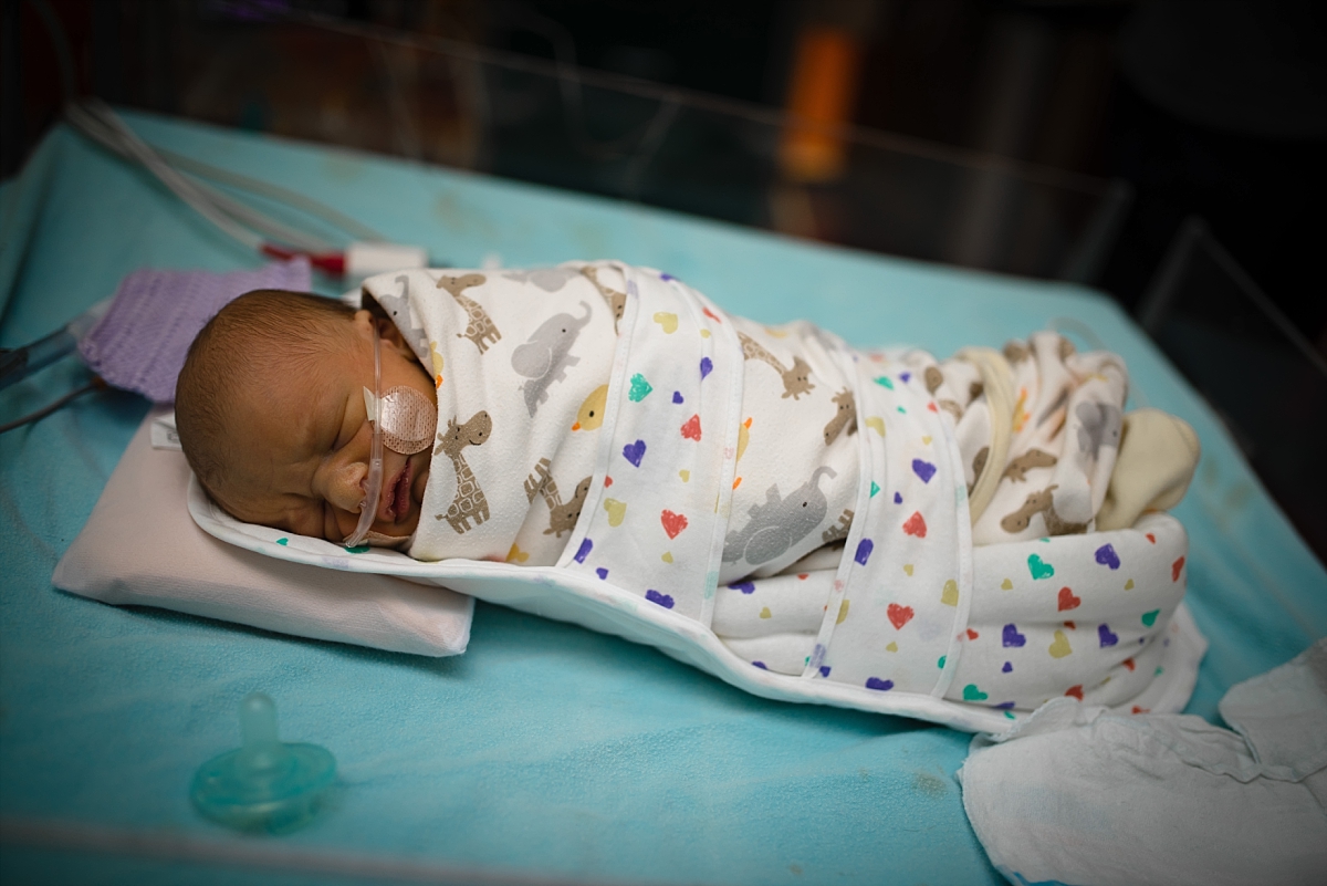Swaddled newborn during his Atlanta NICU Fresh 48 photography session at CHOA by Atlanta birth photographer Amber Watson